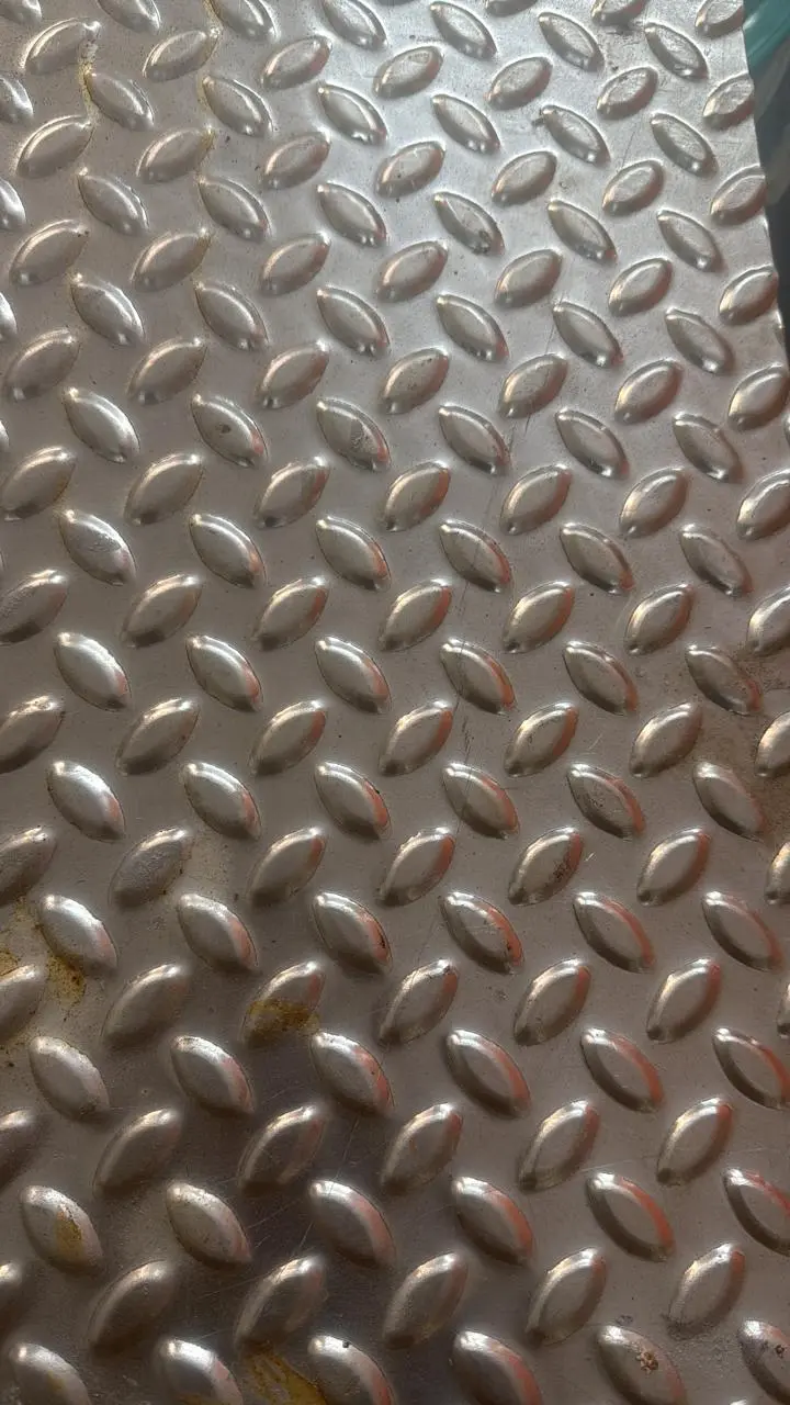 checkered emboss design on metal sheet produced by embossing machine